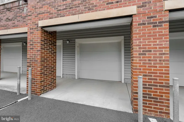 a view of front door of house and stairs