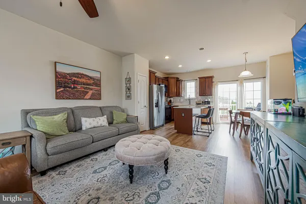 a living room with furniture and a table
