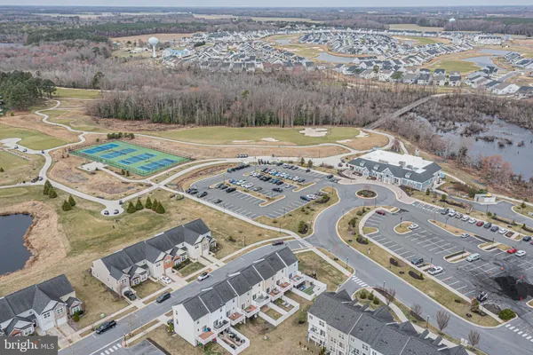 an aerial view of a house with a lake view