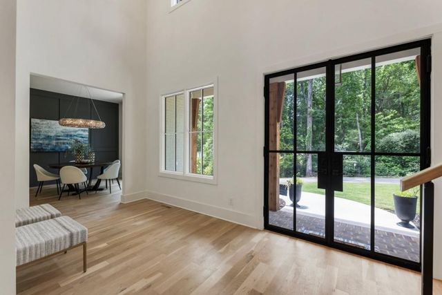a view of livingroom with furniture and floor to ceiling window