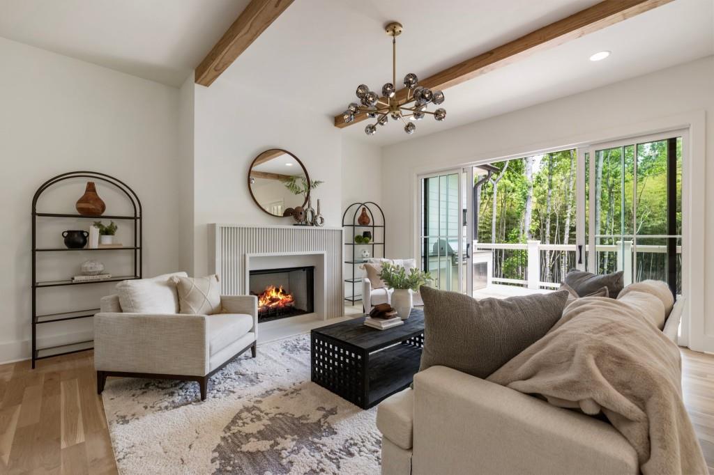 2000 Birmingham Road Milton, GA 30004 - Photo 4 of 42 a living room with furniture and a fireplace