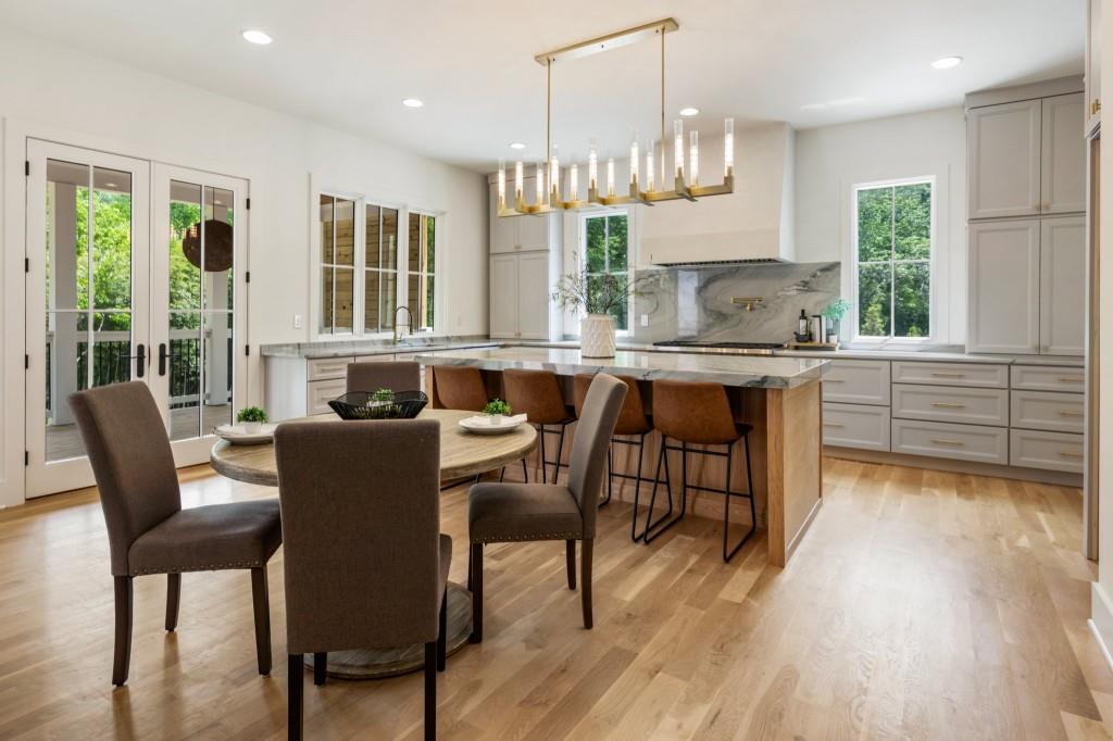 2000 Birmingham Road Milton, GA 30004 - Photo 6 of 42 a view of a dining room with furniture window and wooden floor