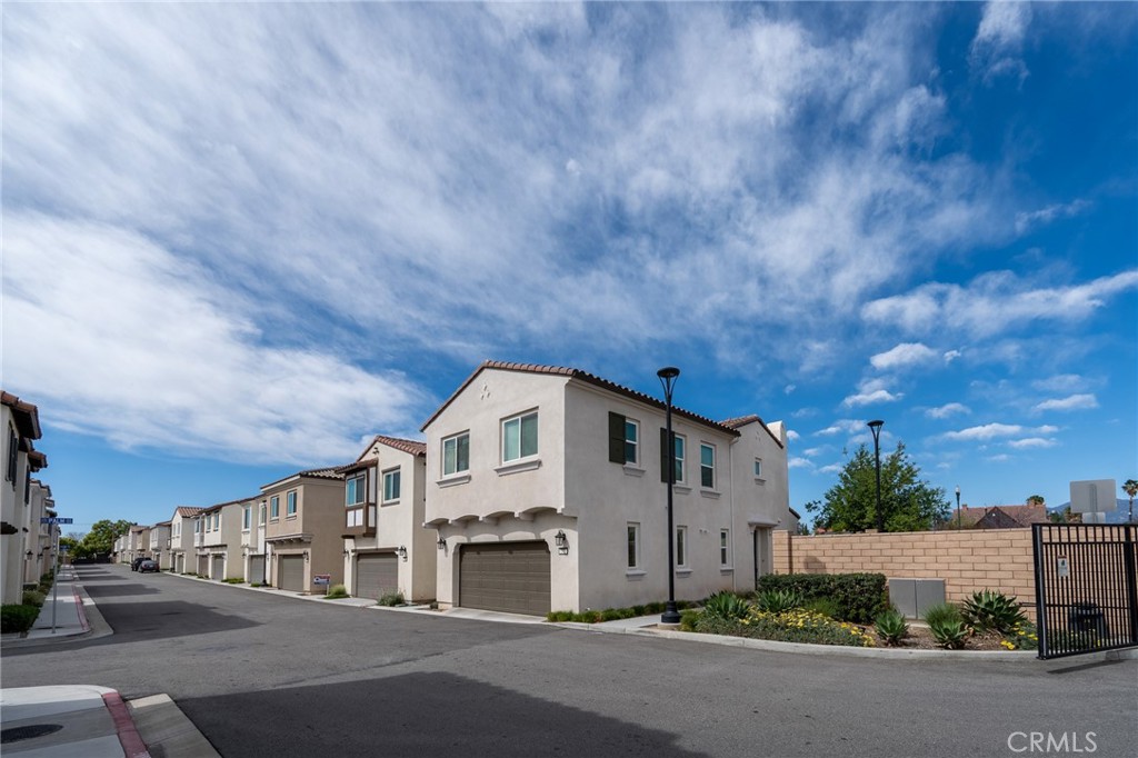202 Bonita Lane Rialto, CA 92376 - Photo 1 of 43 a view of multiple houses with a street
