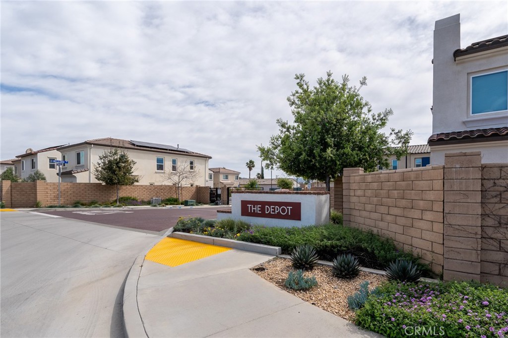 202 Bonita Lane Rialto, CA 92376 - Photo 2 of 43 a front view of a house with a yard and potted plants
