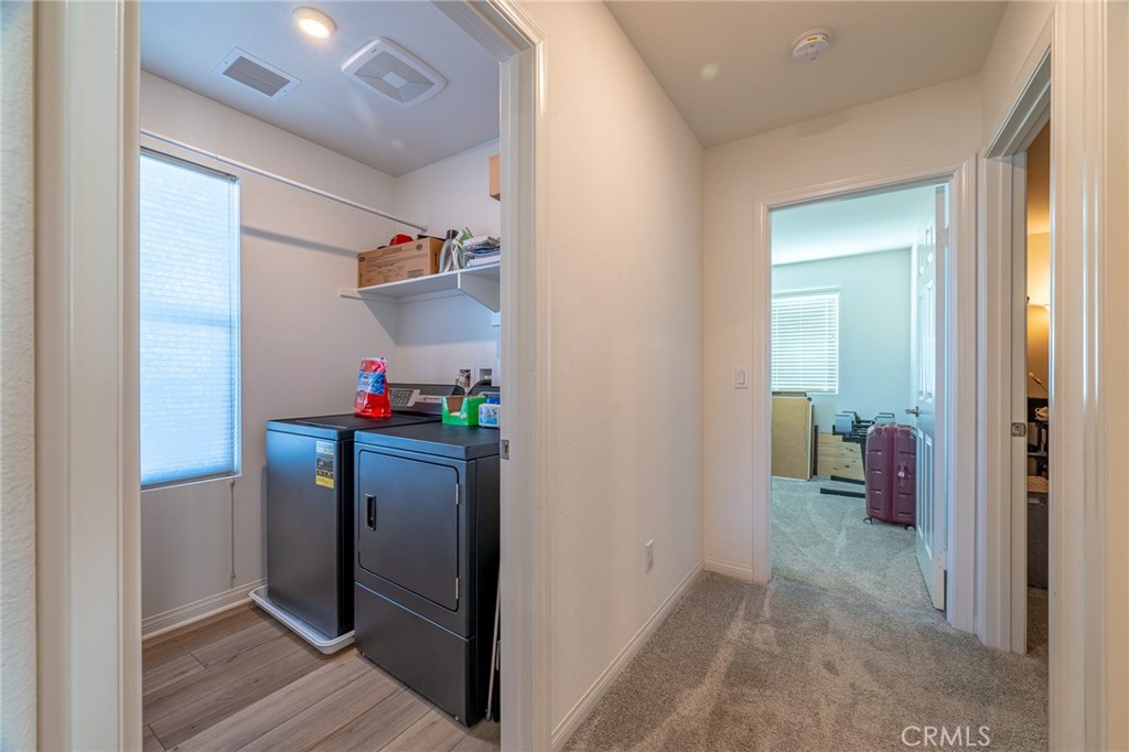 202 Bonita Lane Rialto, CA 92376 - Photo 25 of 43 a room with storage and utility