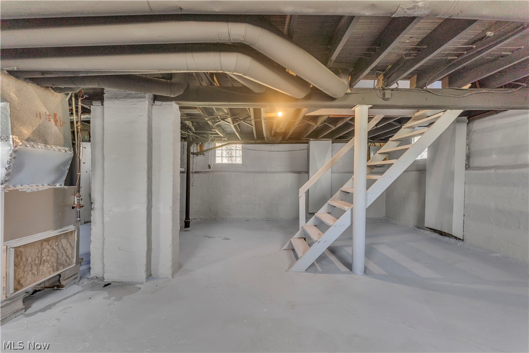 12905 Watterson Avenue Cleveland, OH 44105 - Photo 28 of 30 Below grade area featuring stairway and heating unit