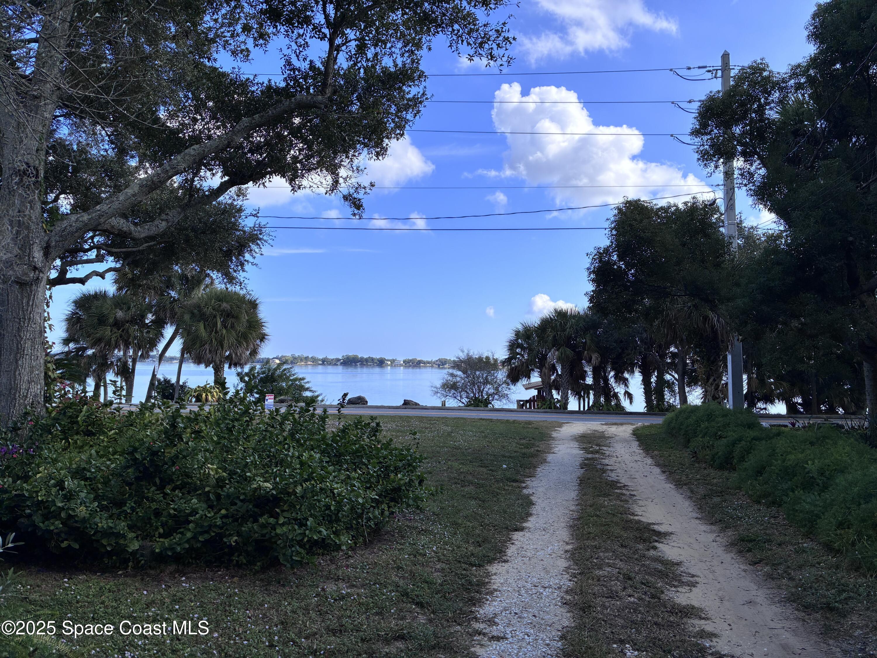 803 Rockledge Drive, Unit 2 Rockledge, FL 32955 - Photo 15 of 15 a view of a yard with yellow lighting