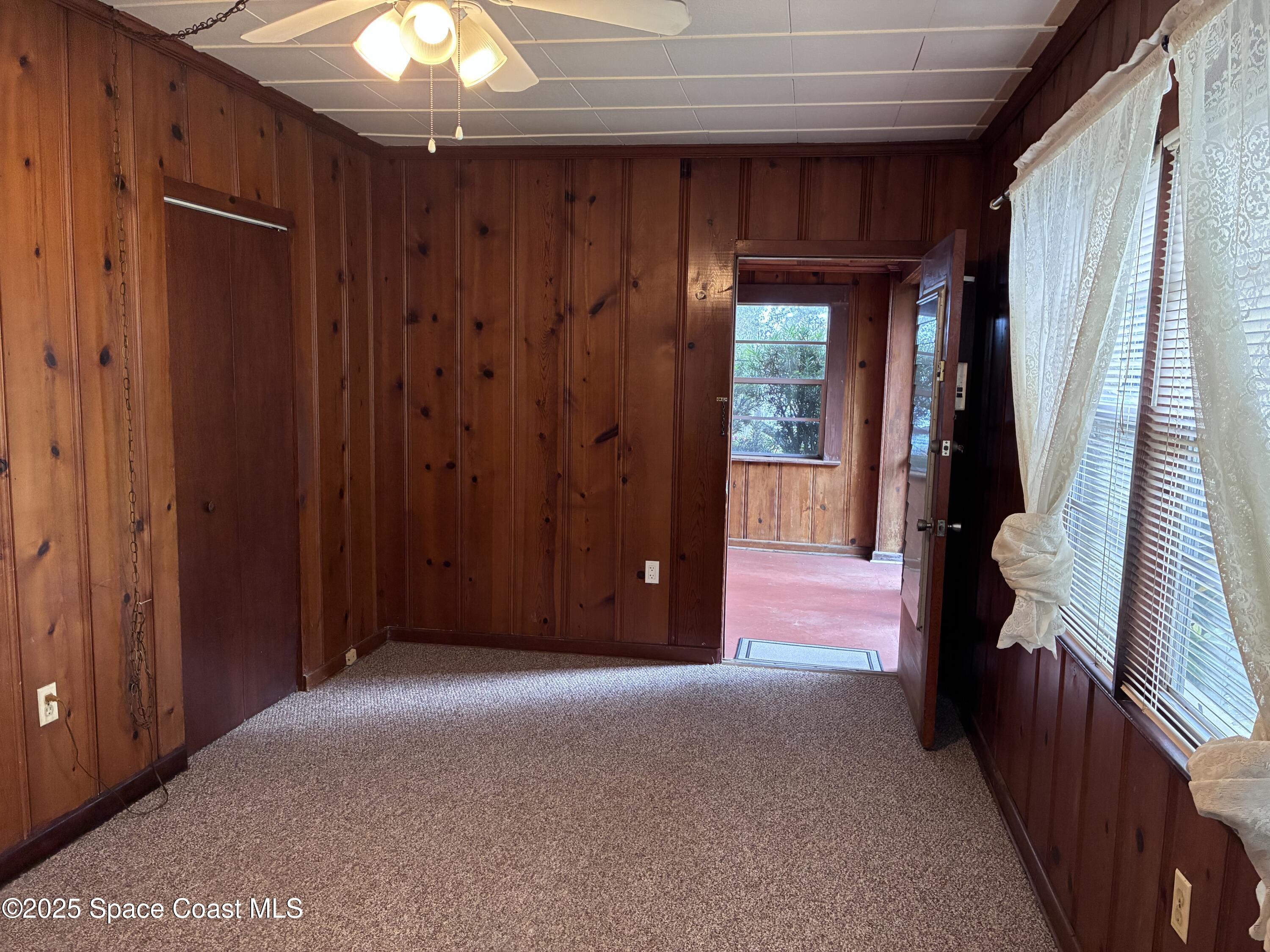 803 Rockledge Drive, Unit 2 Rockledge, FL 32955 - Photo 8 of 15 a view of entryway with wooden walls