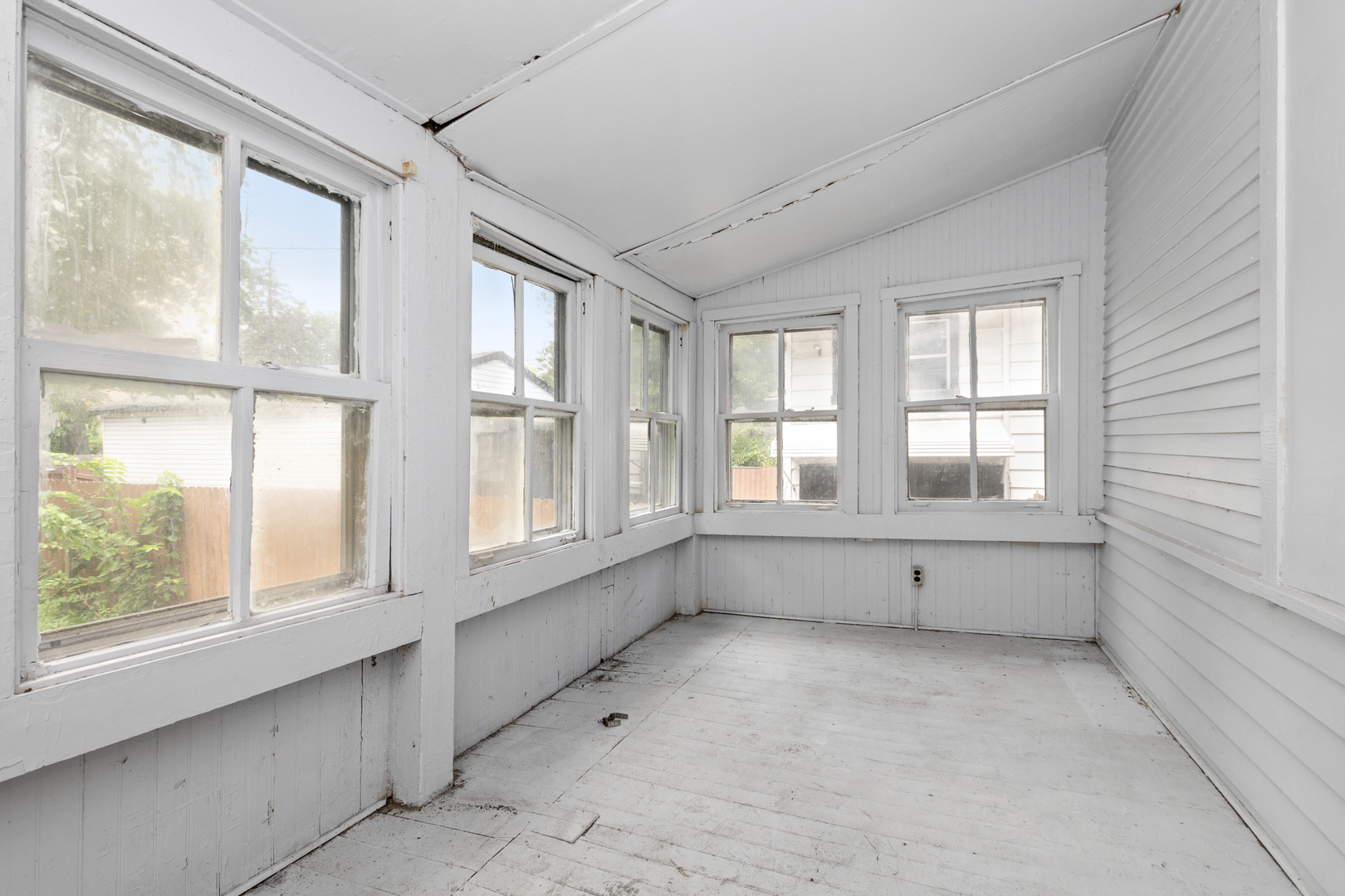 12050 South Yale Avenue Chicago, IL 60628 - Photo 14 of 24 a view of an empty room with a window