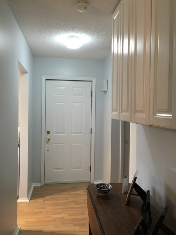 1 Round House Road, Unit 1 Bourne, MA 02532 - Photo 3 of 11 an empty room with windows