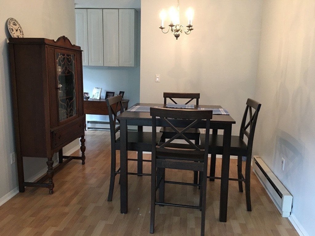 1 Round House Road, Unit 1 Bourne, MA 02532 - Photo 6 of 11 a view of a dining room with furniture