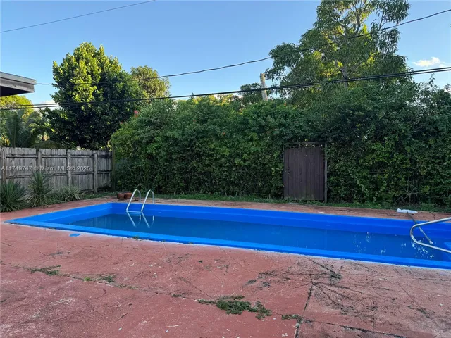 a view of swimming pool with outdoor space