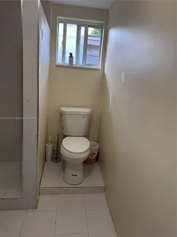 a bathroom with a toilet