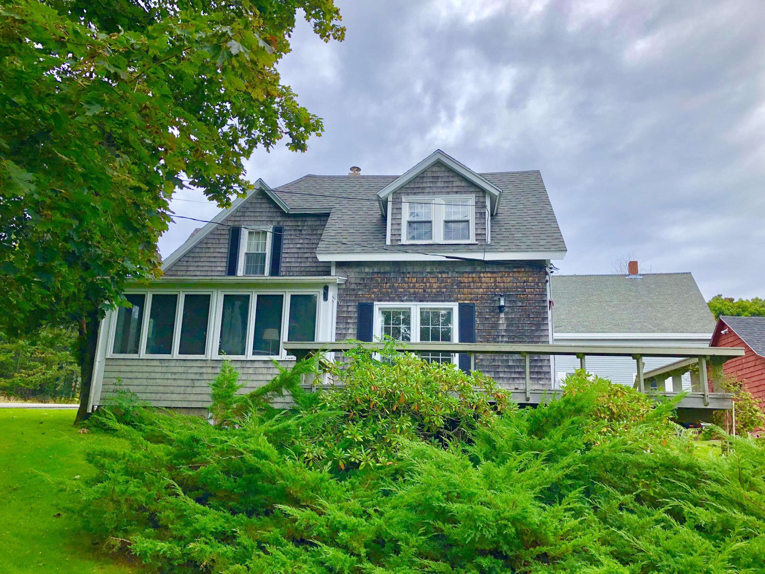 104 Bernard Road Bernard, ME 04612 - Photo 2 of 63 Exterior side of home with deck