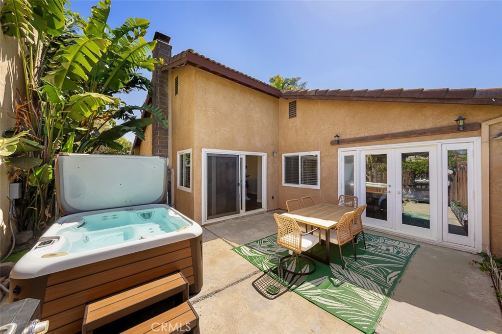 4773 Adler Way Oceanside, CA 92057 - Photo 15 of 29 a backyard of a house with a table and chairs