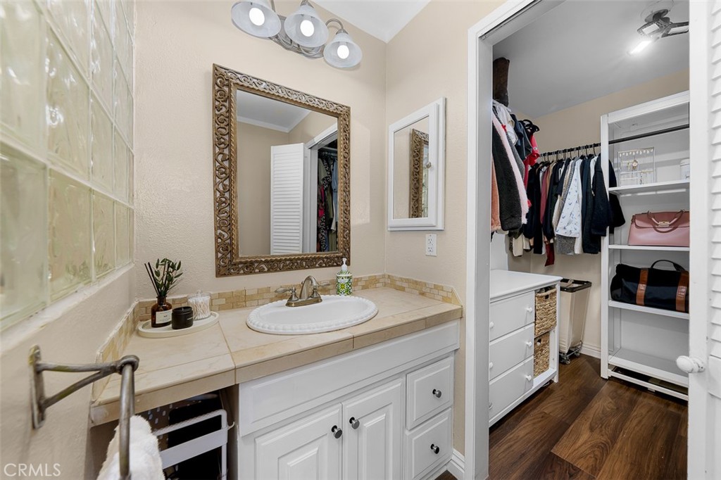 4773 Adler Way Oceanside, CA 92057 - Photo 23 of 29 a bathroom with a sink double vanity and a mirror