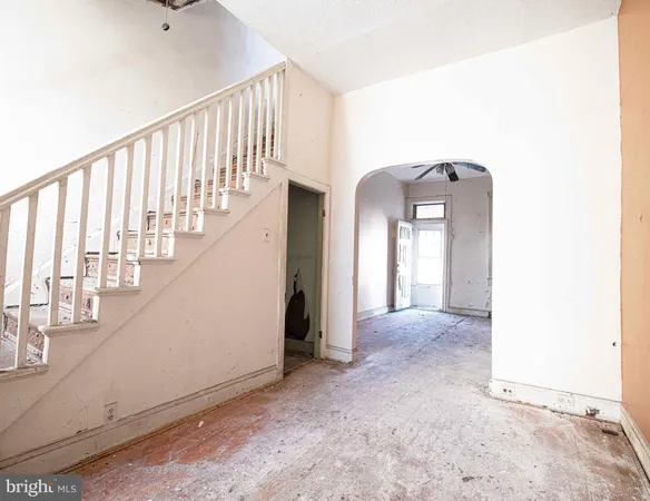 a view of a hallway with staircase