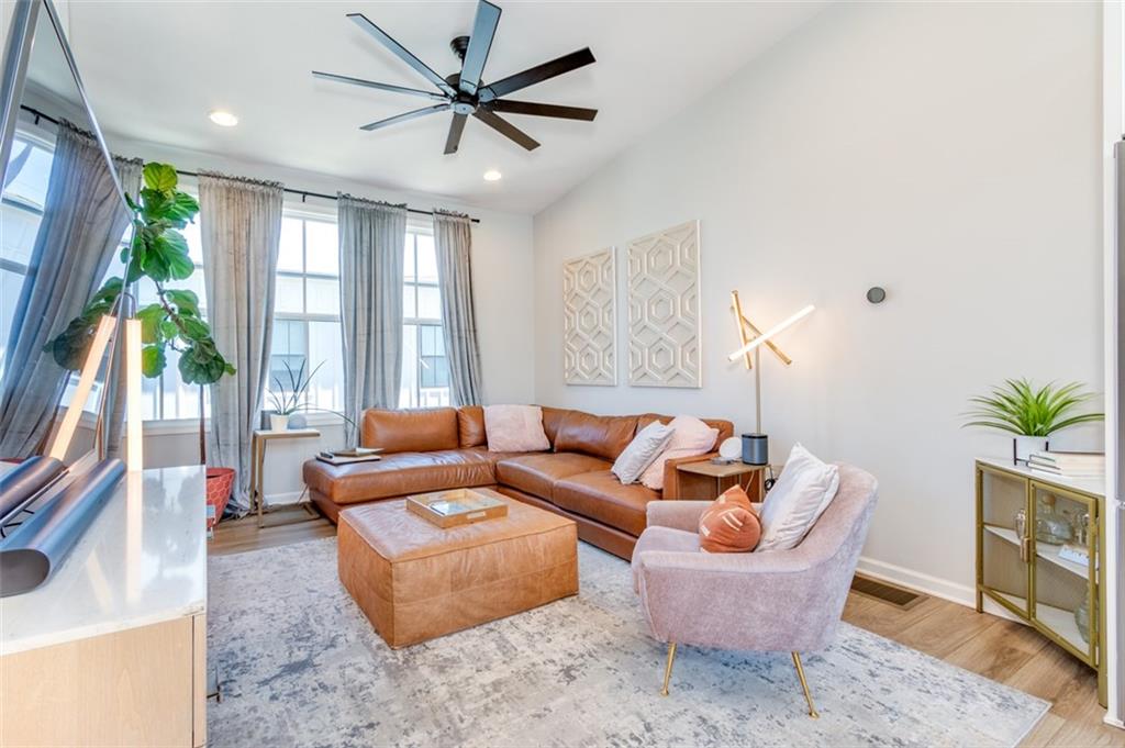 912 Brees Court Atlanta, GA 30318 - Photo 14 of 33 a living room with furniture and a large window
