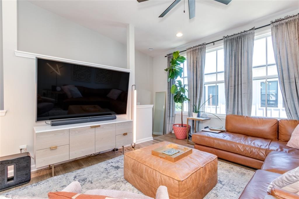 912 Brees Court Atlanta, GA 30318 - Photo 15 of 33 a living room with furniture and a flat screen tv