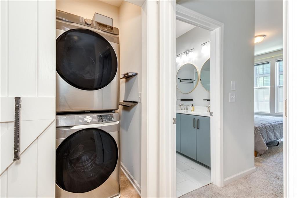 912 Brees Court Atlanta, GA 30318 - Photo 23 of 33 a view of a hallway with washer and dryer