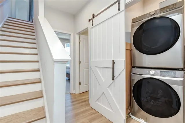 a bathroom with a sink and mirror with toilet