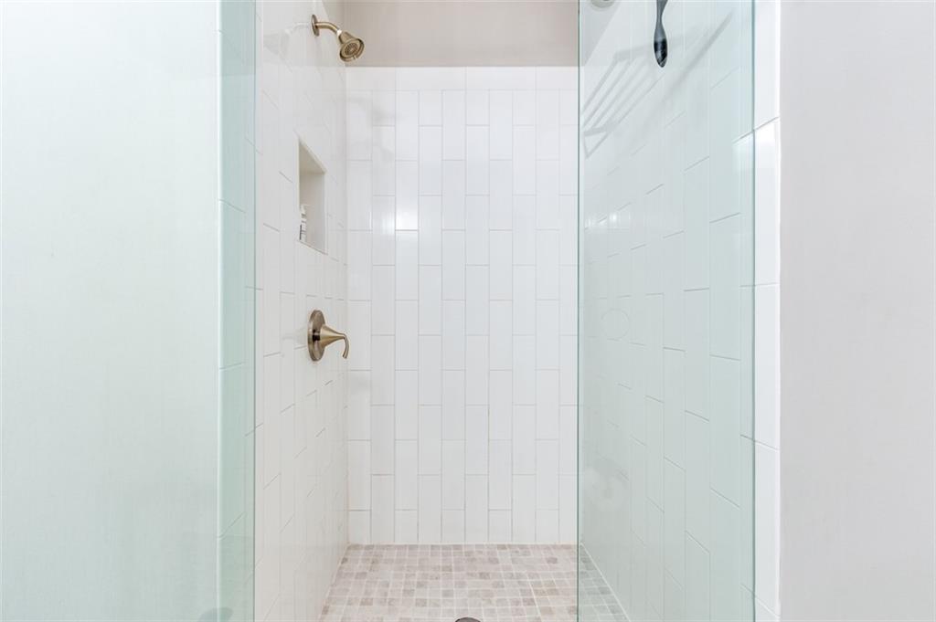 912 Brees Court Atlanta, GA 30318 - Photo 27 of 33 a bathroom with a shower
