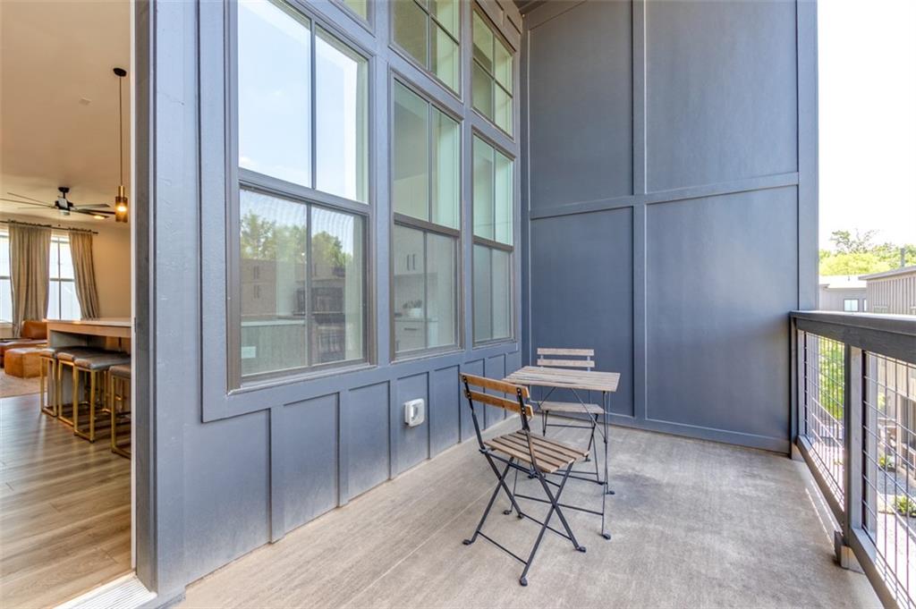 912 Brees Court Atlanta, GA 30318 - Photo 6 of 33 a view of a room that has a window and wooden floor