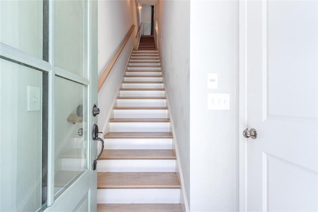 912 Brees Court Atlanta, GA 30318 - Photo 9 of 33 a view of staircase with white walls