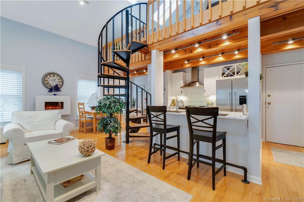 55 Cherry Street, Unit R1 Milford, CT 06460 - Photo 1 of 1 Living room/breakfast bar/kitchen/dining area