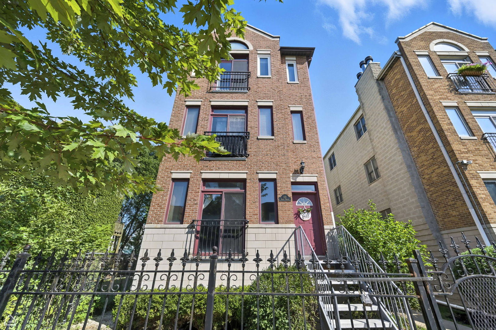 front view of a house with a small yard