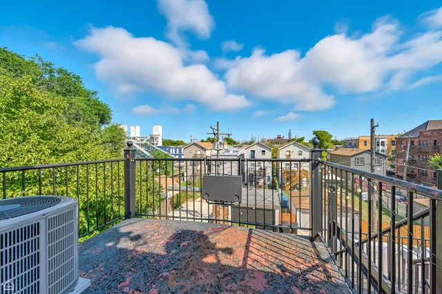 a view of city from a balcony