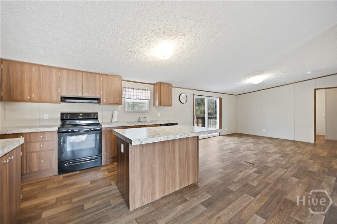 2599 Black Creek Church Road Ellabell, GA 31308 - Photo 15 of 40 Kitchen area and breakfast area