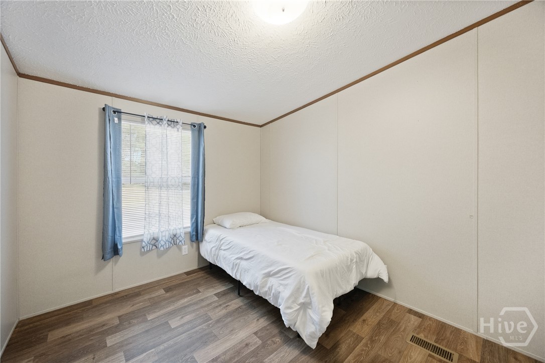 2599 Black Creek Church Road Ellabell, GA 31308 - Photo 29 of 40 Guest bedroom 3