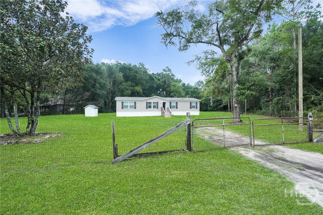 2599 Black Creek Church Road Ellabell, GA 31308 - Photo 7 of 40 Front view of home