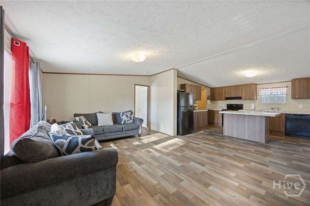 2599 Black Creek Church Road Ellabell, GA 31308 - Photo 10 of 40 Entertainment area overlooking the kitchen