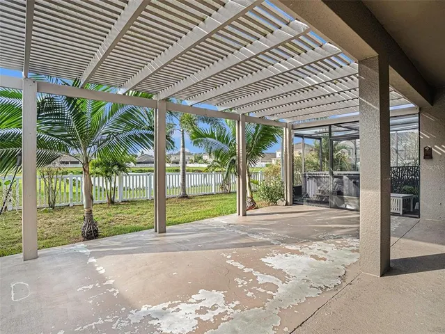 a view of a house with backyard and porch