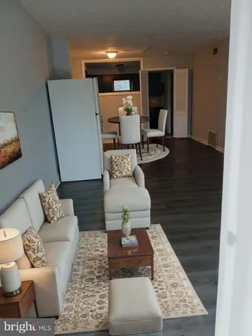 a living room with furniture and a couch