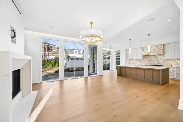 a view of kitchen with furniture and fireplace