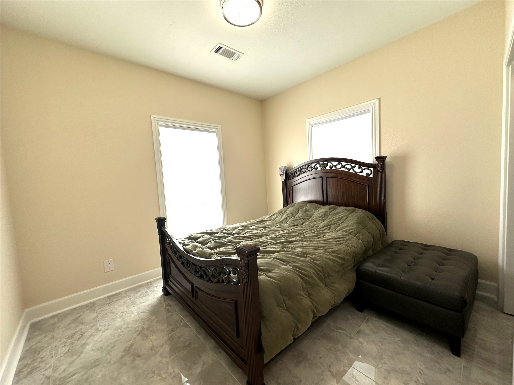 4334 Maass Road Burton, TX 77835 - Photo 12 of 44 a bedroom with a bed and window