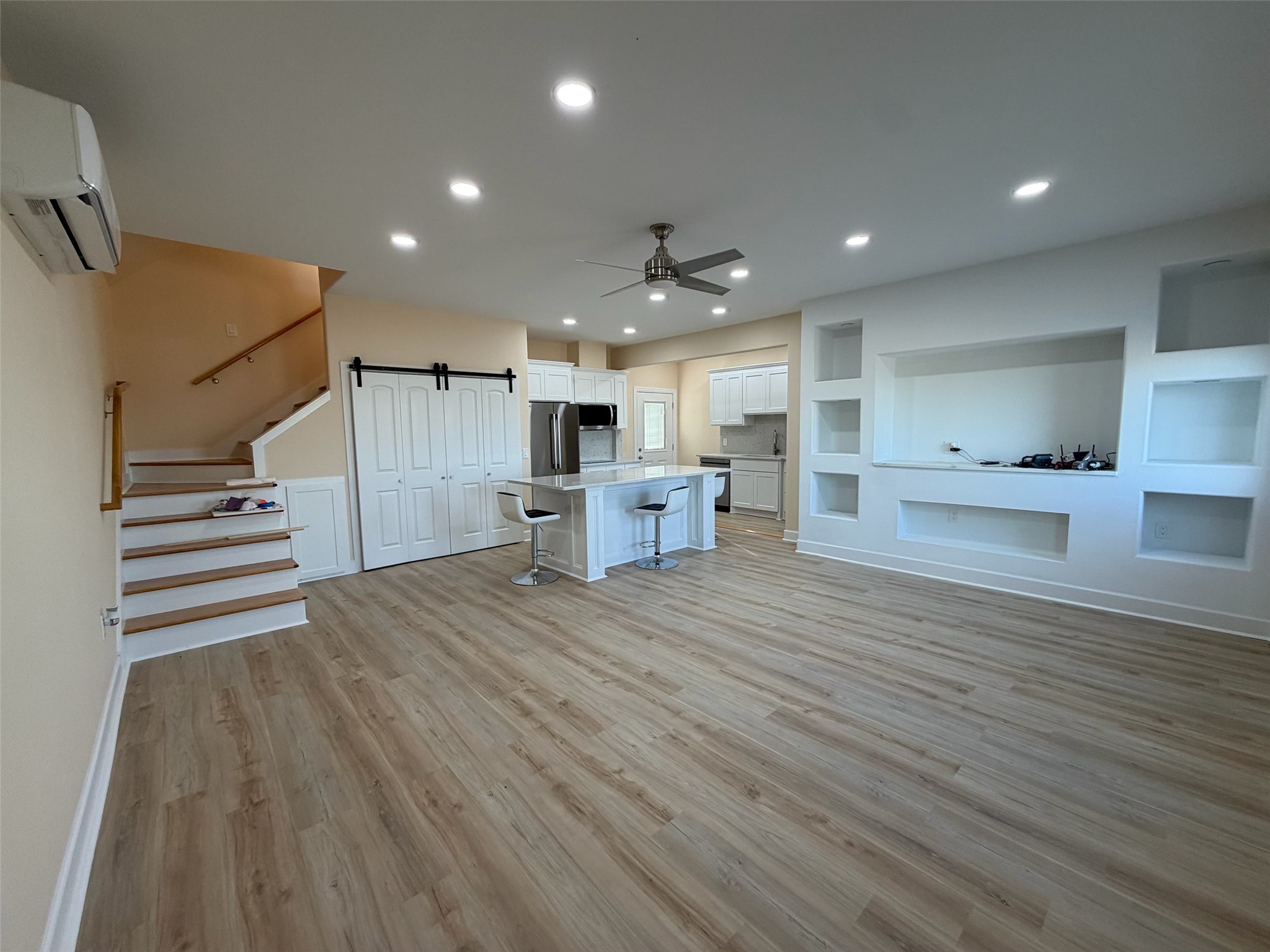 4334 Maass Road Burton, TX 77835 - Photo 28 of 44 a view of kitchen with furniture and wooden floor