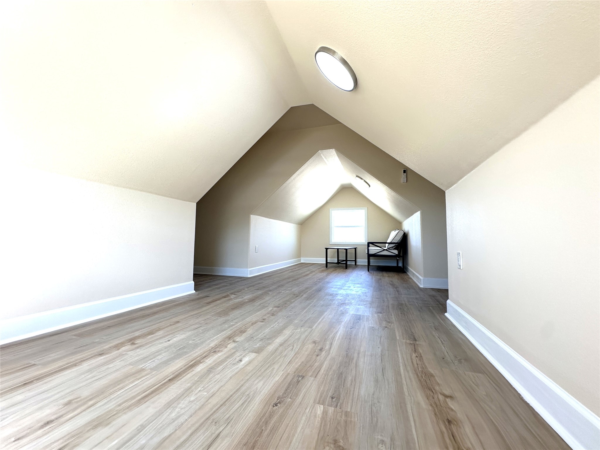 4334 Maass Road Burton, TX 77835 - Photo 30 of 44 a view of empty room with wooden floor