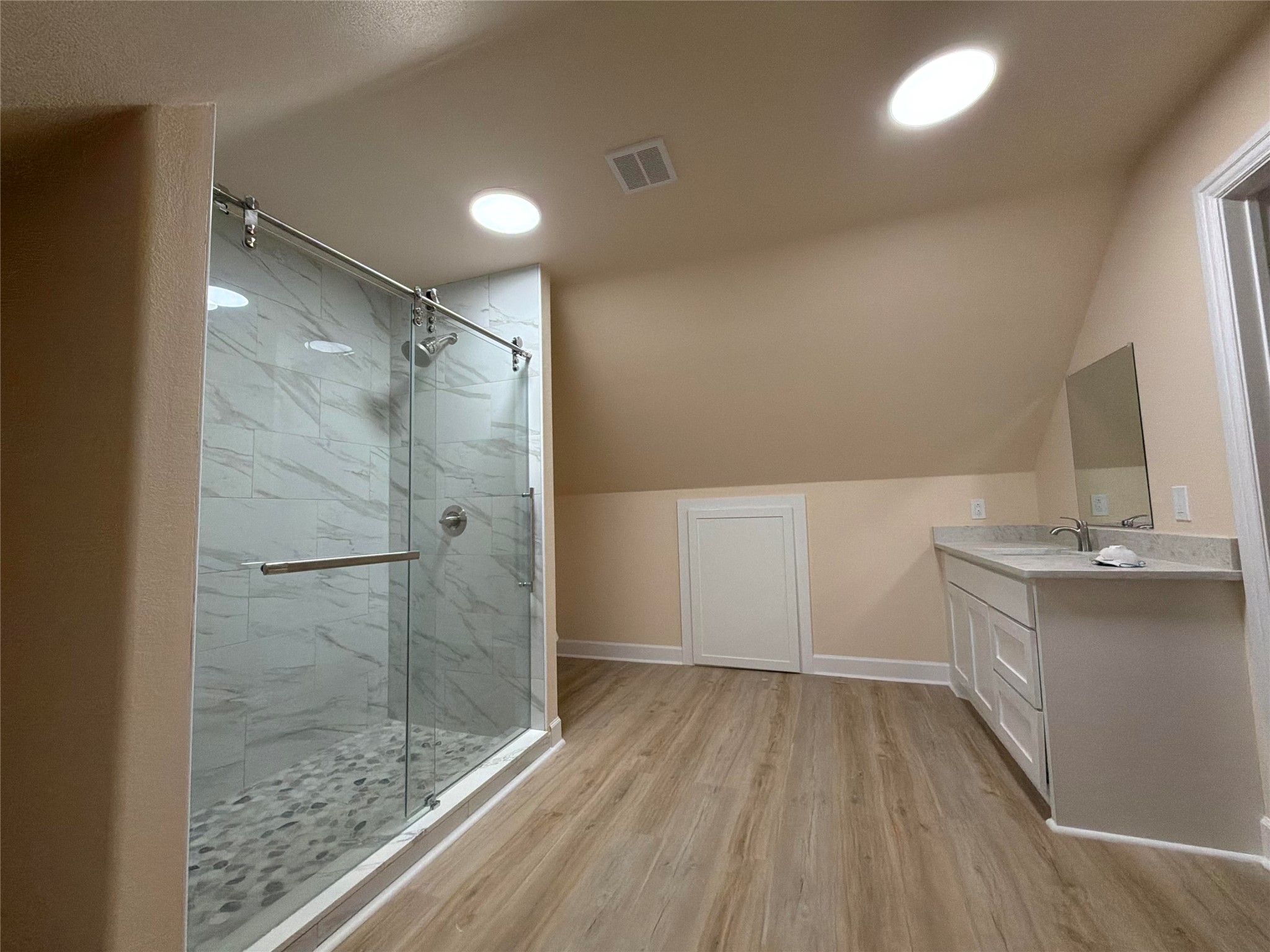 4334 Maass Road Burton, TX 77835 - Photo 34 of 44 a bathroom with a sink and a mirror