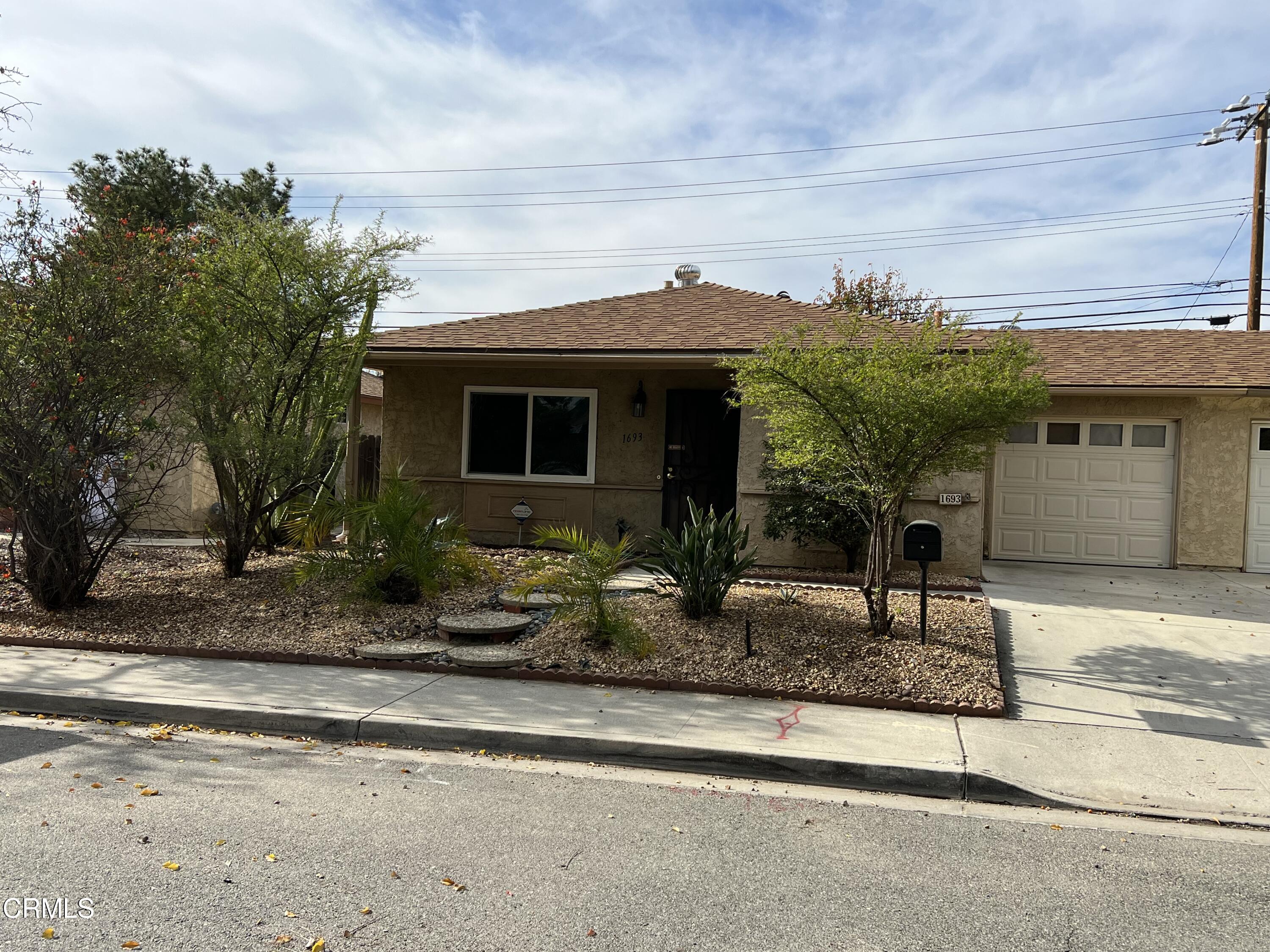 1693 Sequoia Avenue Simi Valley, CA 93063 - Photo 12 of 18 a front view of house with yard