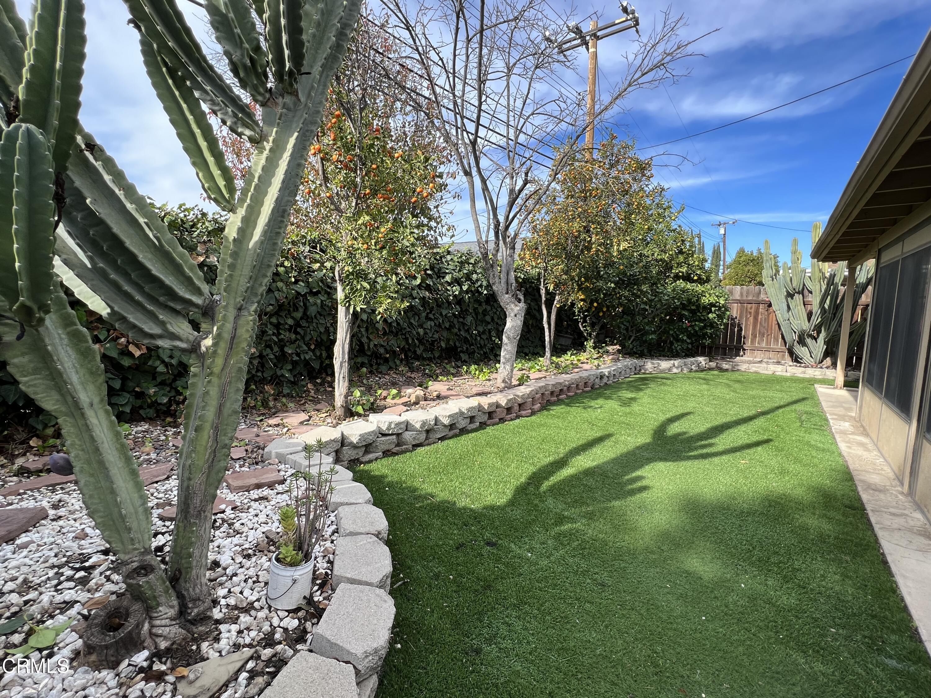 1693 Sequoia Avenue Simi Valley, CA 93063 - Photo 16 of 18 a view of a backyard with large trees