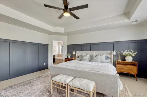 a bedroom with a bed and closet
