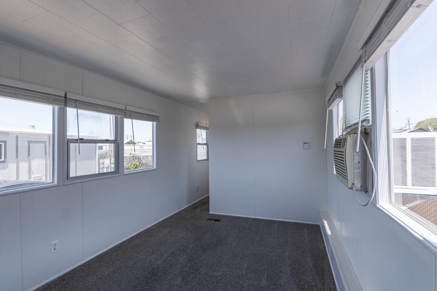 1740 Broadway, Unit 29 Vallejo, CA 94589 - Photo 7 of 12 an empty room with windows