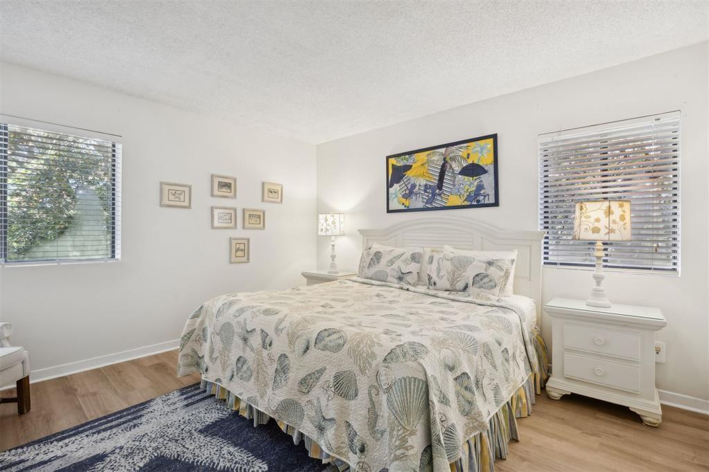 2021 Beachwood Road, Unit 2021 Fernandina Beach, FL 32034 - Photo 5 of 32 a bedroom with a bed and a window