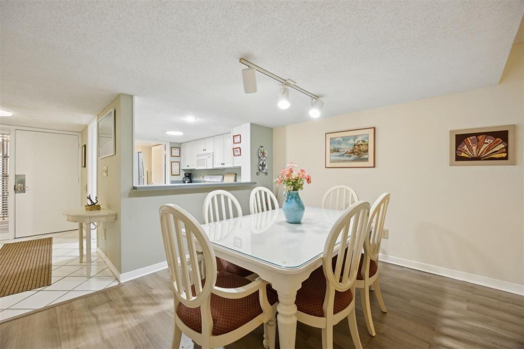 2021 Beachwood Road, Unit 2021 Fernandina Beach, FL 32034 - Photo 10 of 32 a view of a dining room with furniture