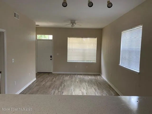 an empty room with windows