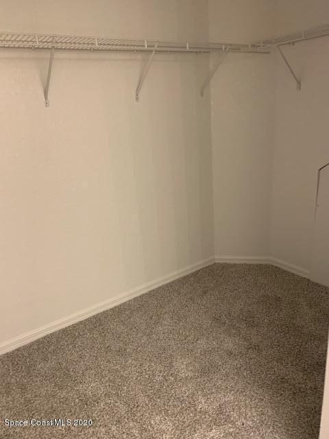 110 Colibri Way, Unit 105 Melbourne, FL 32901 - Photo 9 of 16 a view of a room with shelf